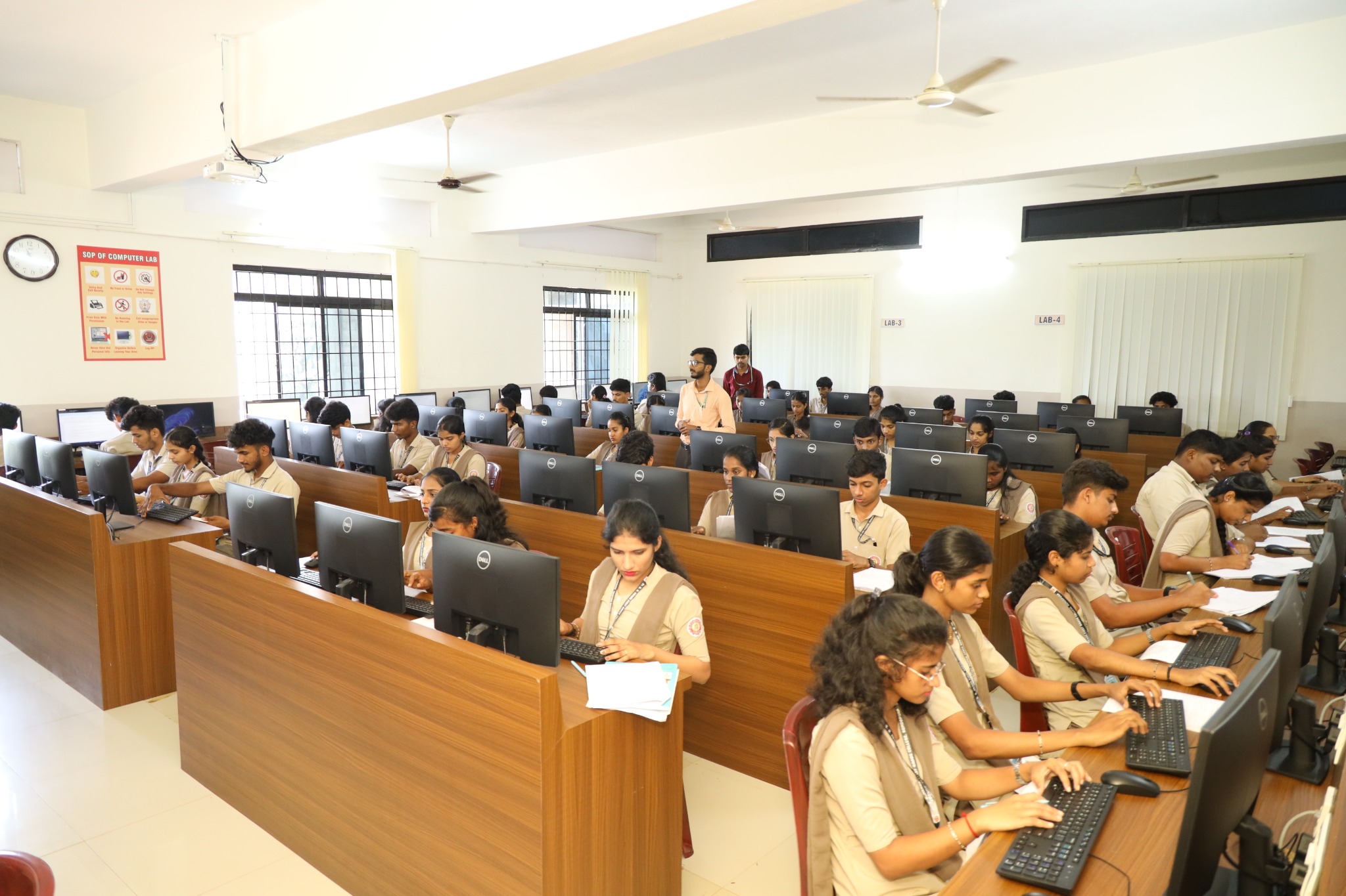 Students working at desktop computers in the college computer laboratory
